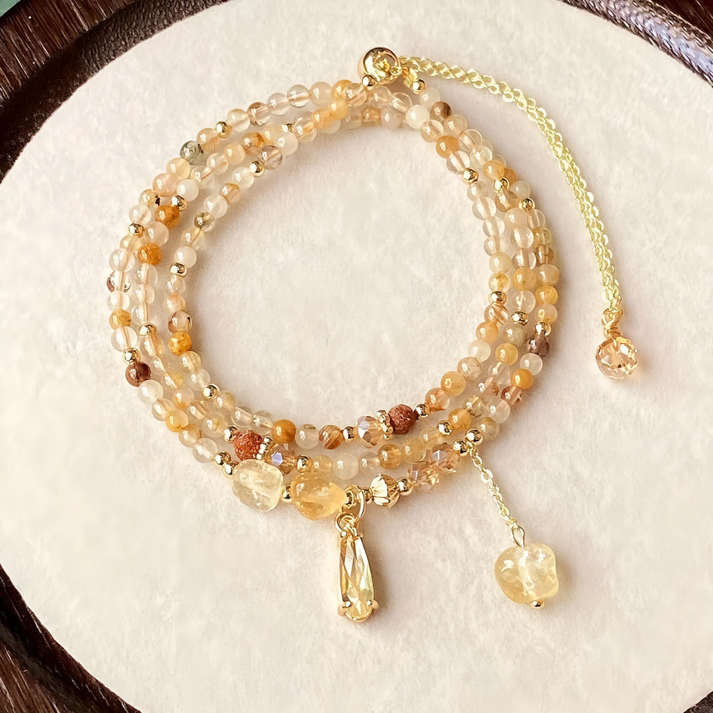 Natural citrine multi-layer hair crystal bracelet in gold electroplated finish with Saturn design element