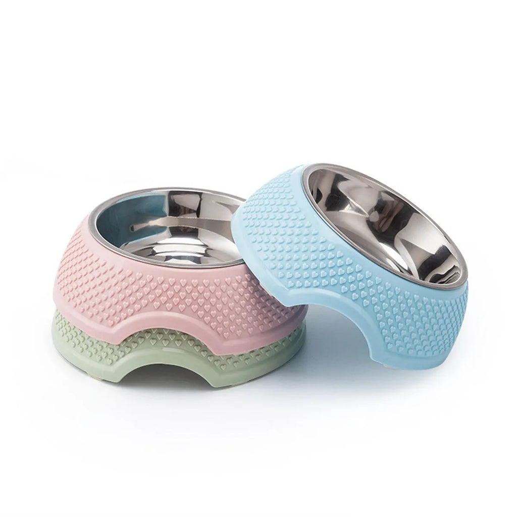 Set of four stainless steel pet bowls with coloured bases, shown from above.