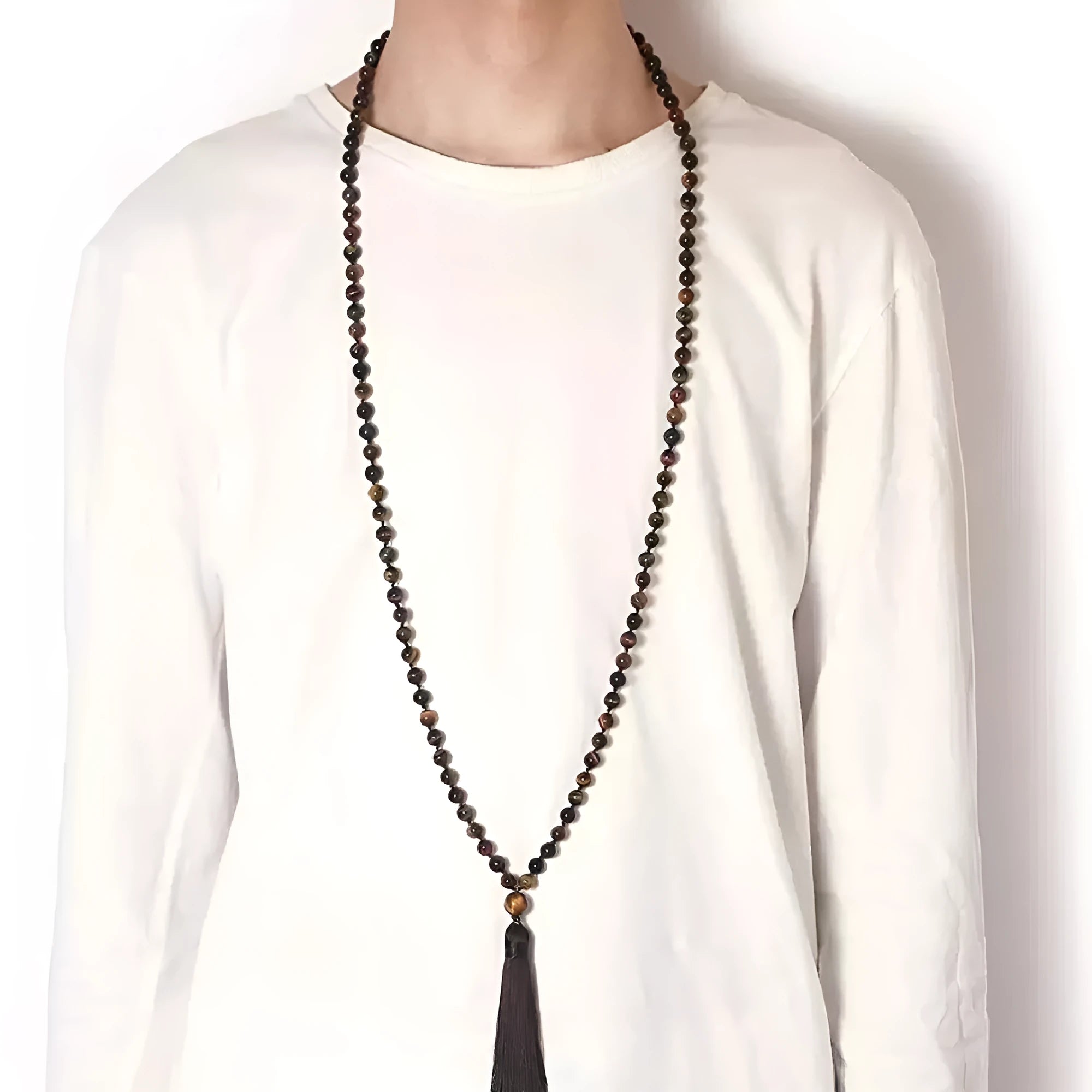 Agate tassel necklace with geometric pattern featuring multiple colourful stones including amethyst and lapis lazuli