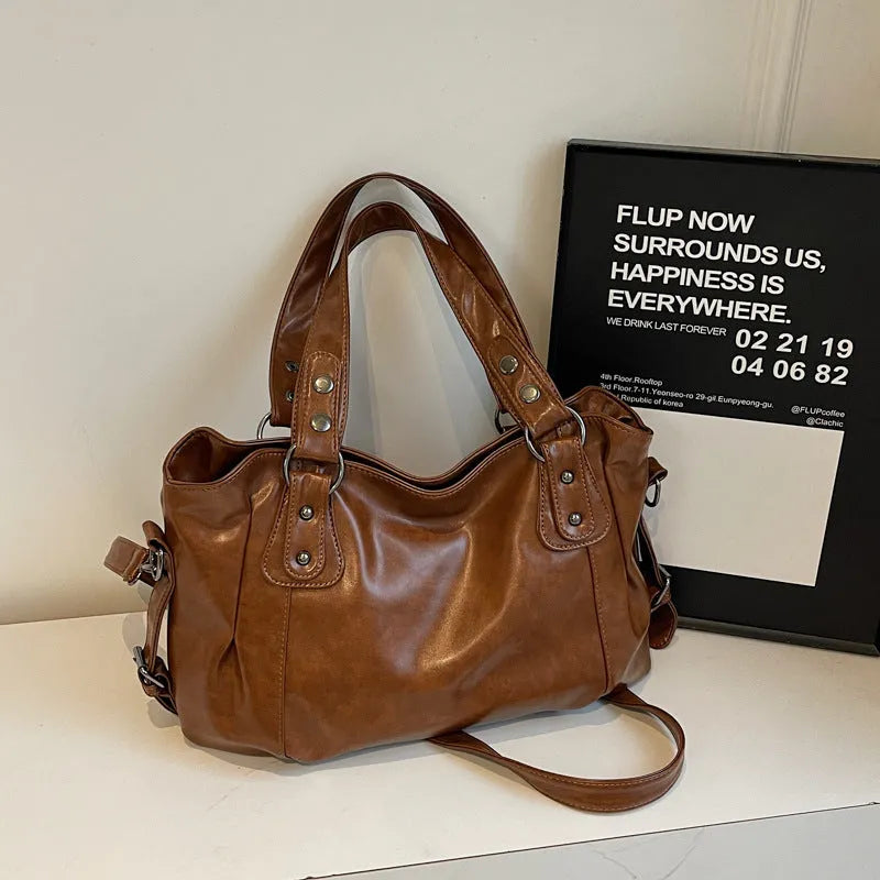 Large capacity women's messenger bag in soft PU leather, horizontal square shape, with double shoulder straps, available in multiple colours