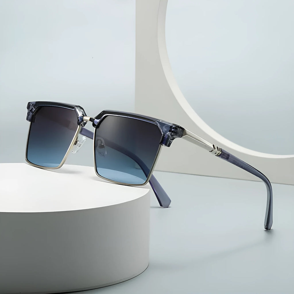Men's square frame sunglasses with plastic construction in a box style, shown in one of six available colours.