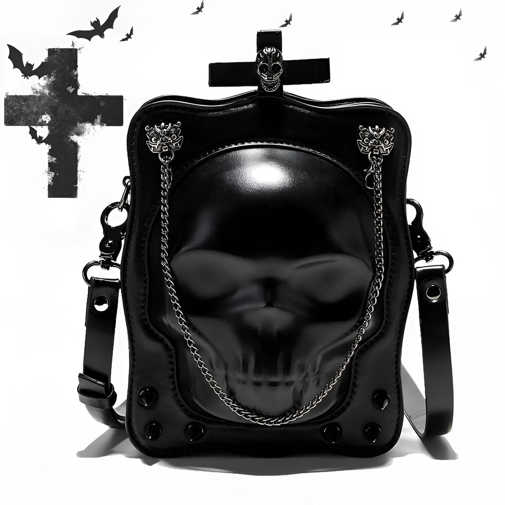 Black mini square crossbody bag with skull embroidery, decorative stitching, and metal chain details