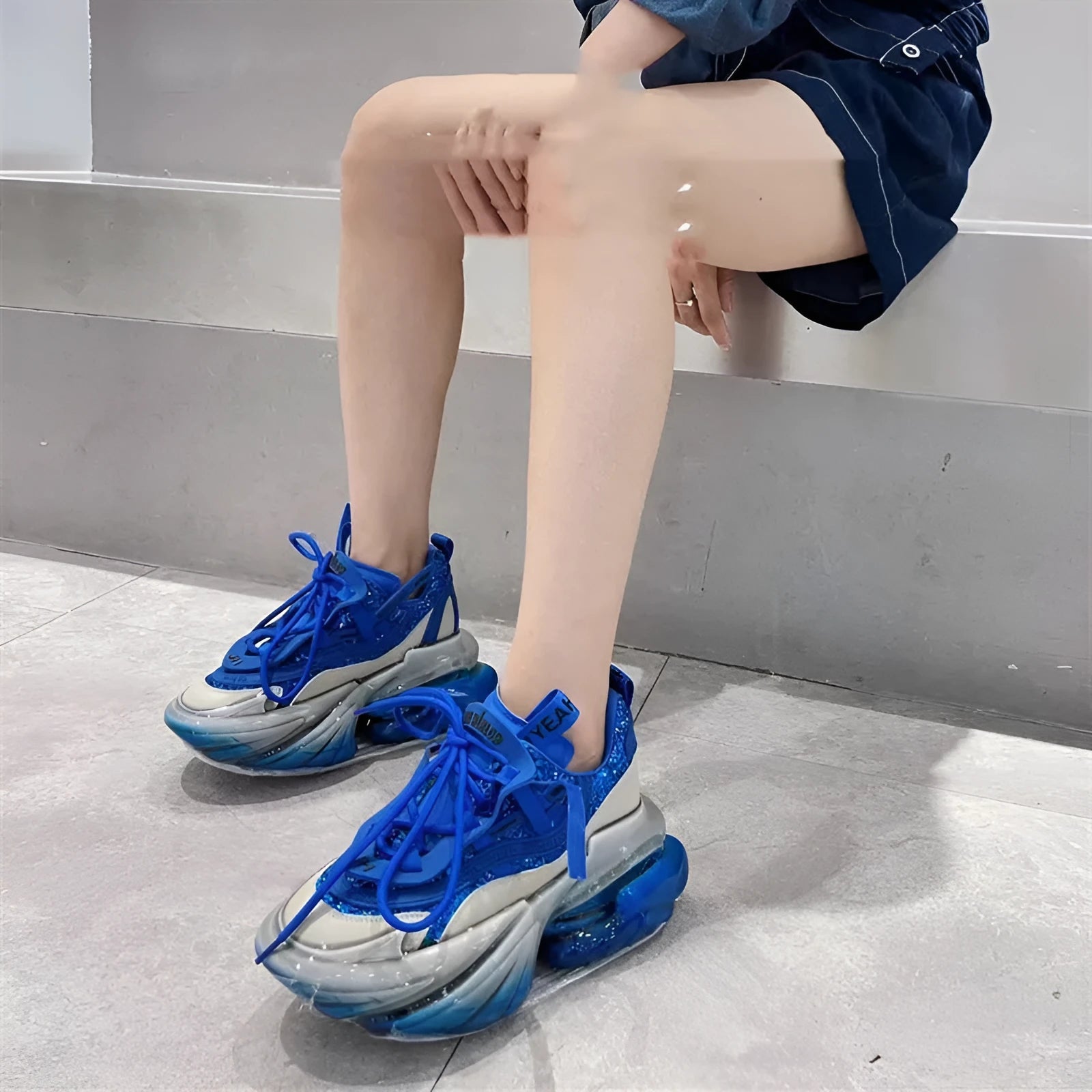 Women's green leather casual sports shoes with jelly detailing and white cross-tie lacing