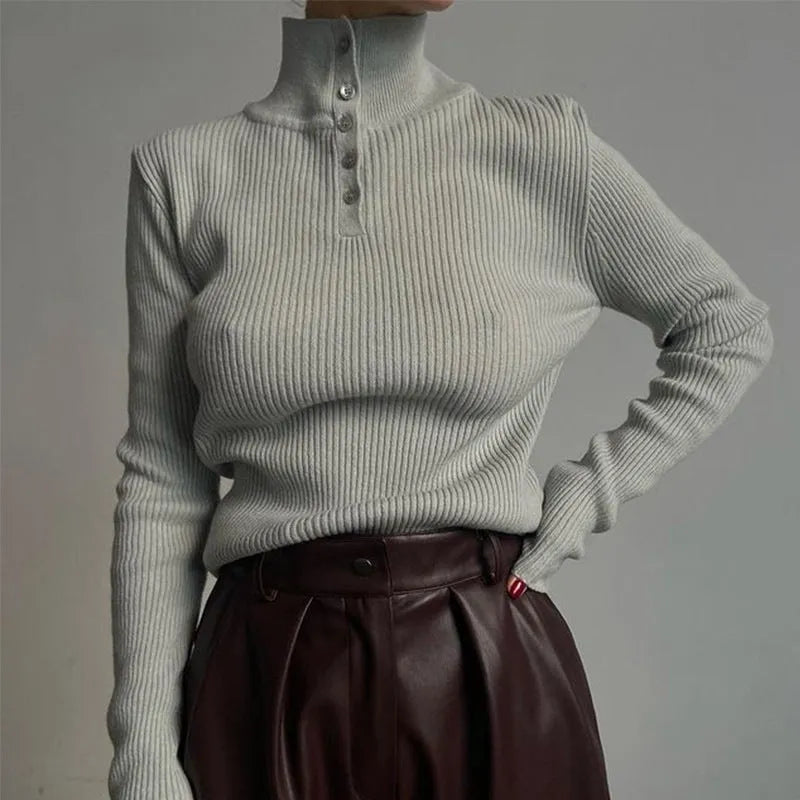 Women's silver grey half turtleneck pullover sweater with a single-breasted placket front.