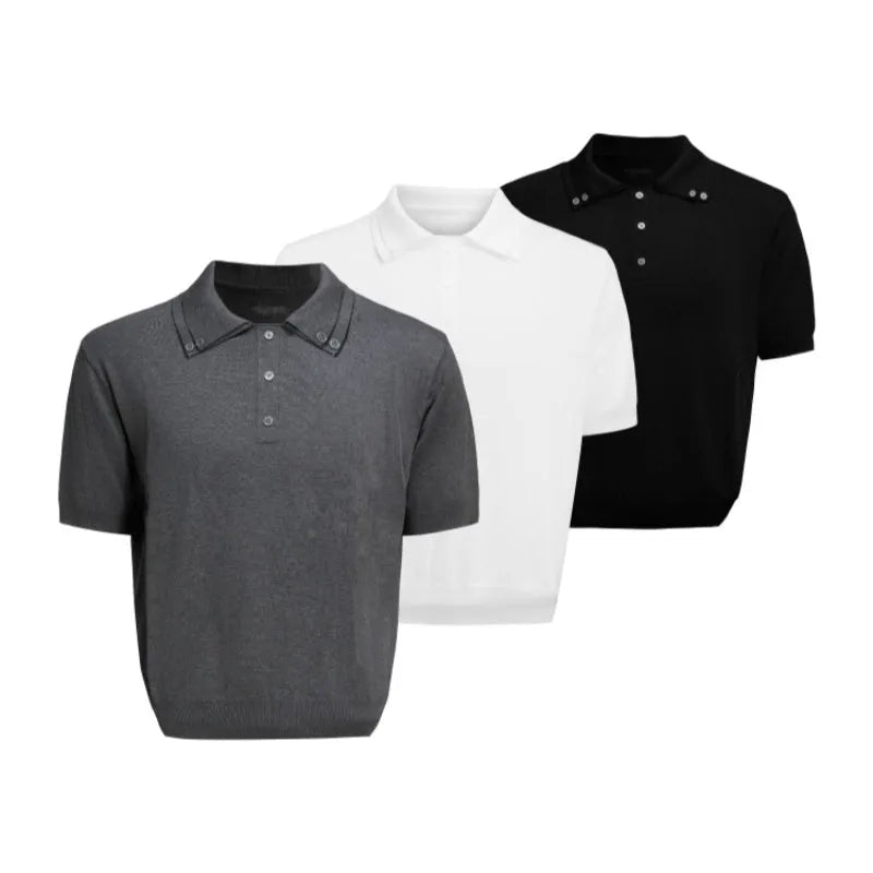 Man wearing a grey short sleeve shirt with a distinctive double collar lapel design.