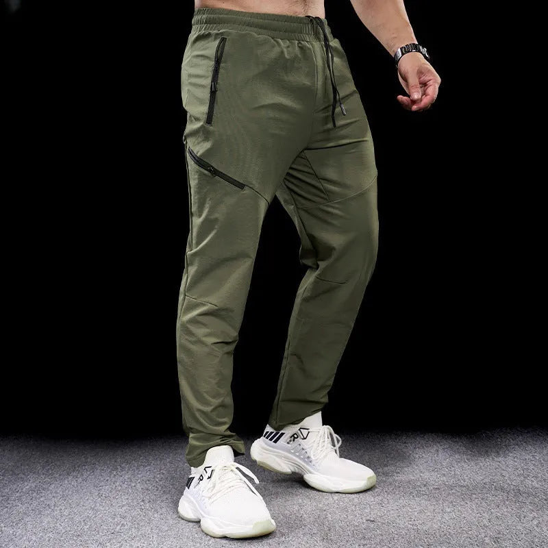 Men's waterproof workout pants in quick-drying nylon fabric for sports and fitness activities