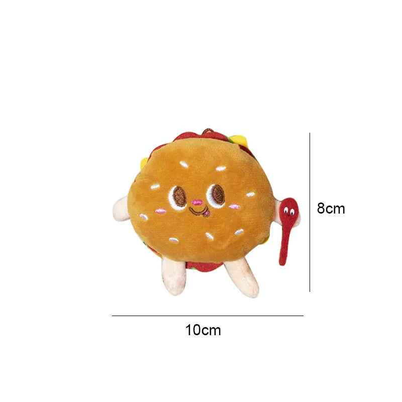 Assorted soft kitten teething toys shaped like a hamburger, chicken leg, fries, bread, and hot dog.