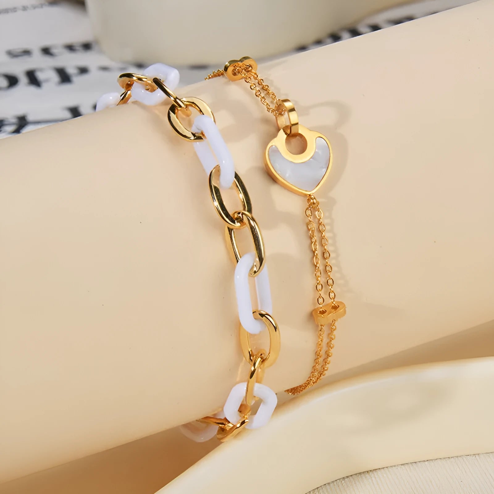 Women's stainless steel resin bracelet with double layered heart design in electroplated silver colour