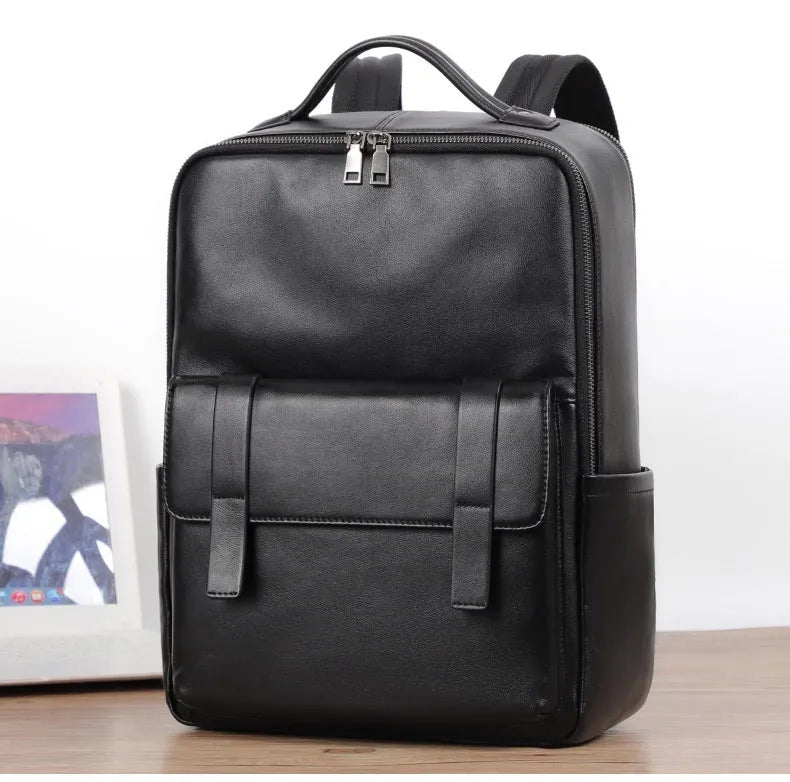 Black genuine leather men's computer backpack with a large main compartment.