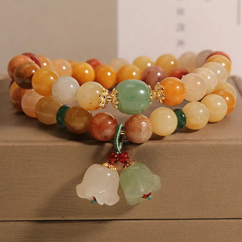 Natural jade multi-layer bracelet with orchid pendant charm and adjustable closure