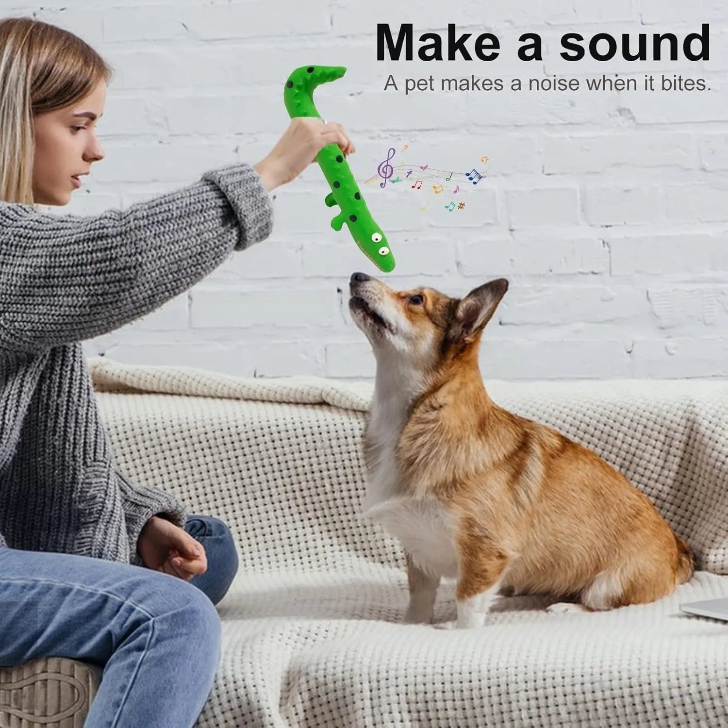 Green lizard-shaped dog chew toy with squeaker for aggressive chewing and teeth cleaning