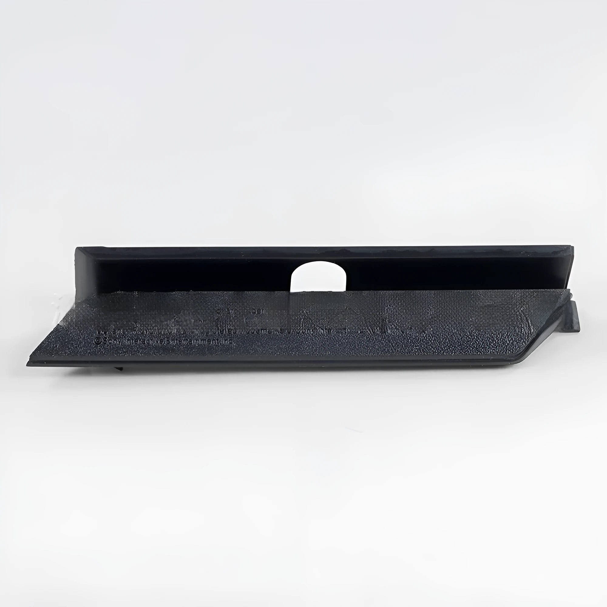 Black and white plastic hard disk baffle cover for 3.5-inch internal drive bays.
