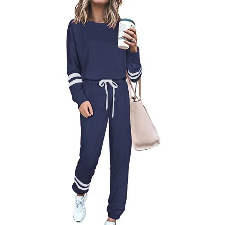 Women's plus size casual two-piece suit set in a solid colour, showing loose-fitting long sleeve top and trousers.
