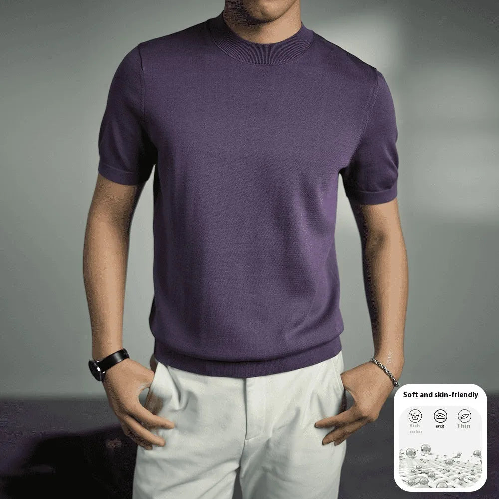 Men's solid colour knitted t-shirt with round neck and short sleeves in a polyester blend fabric.