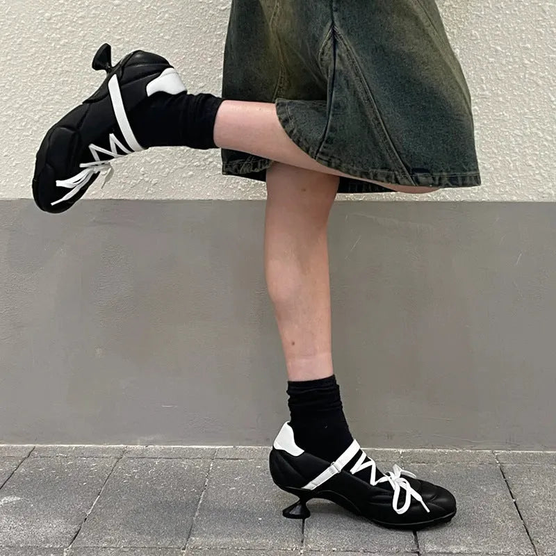 Women's silver creative lace-up bow sports shoes with mid heel and round toe on a white background.