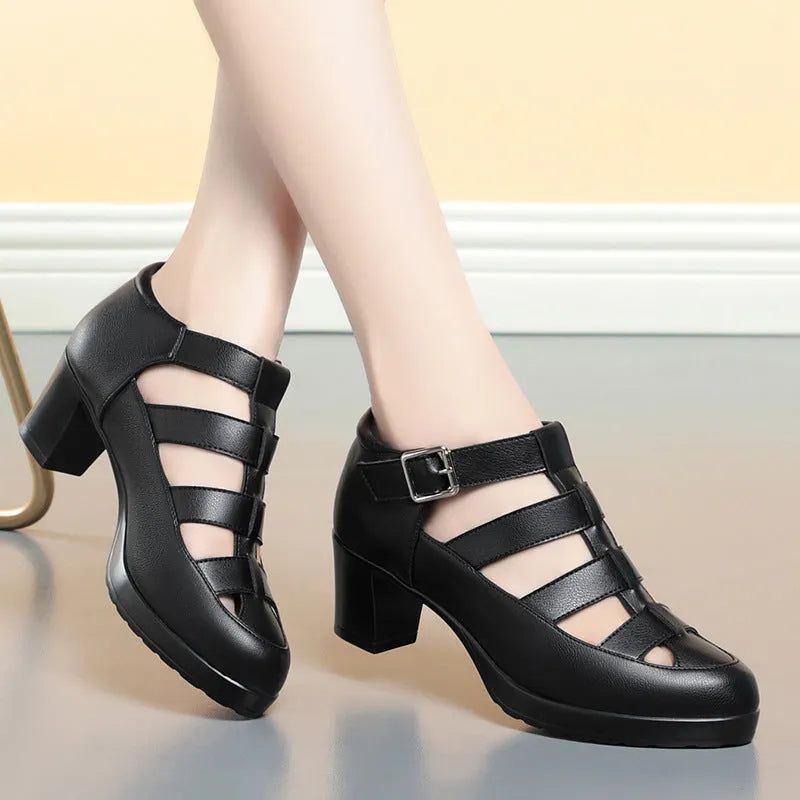 Women's beige closed toe sandals with chunky heel, ankle strap, buckle, and back zipper.