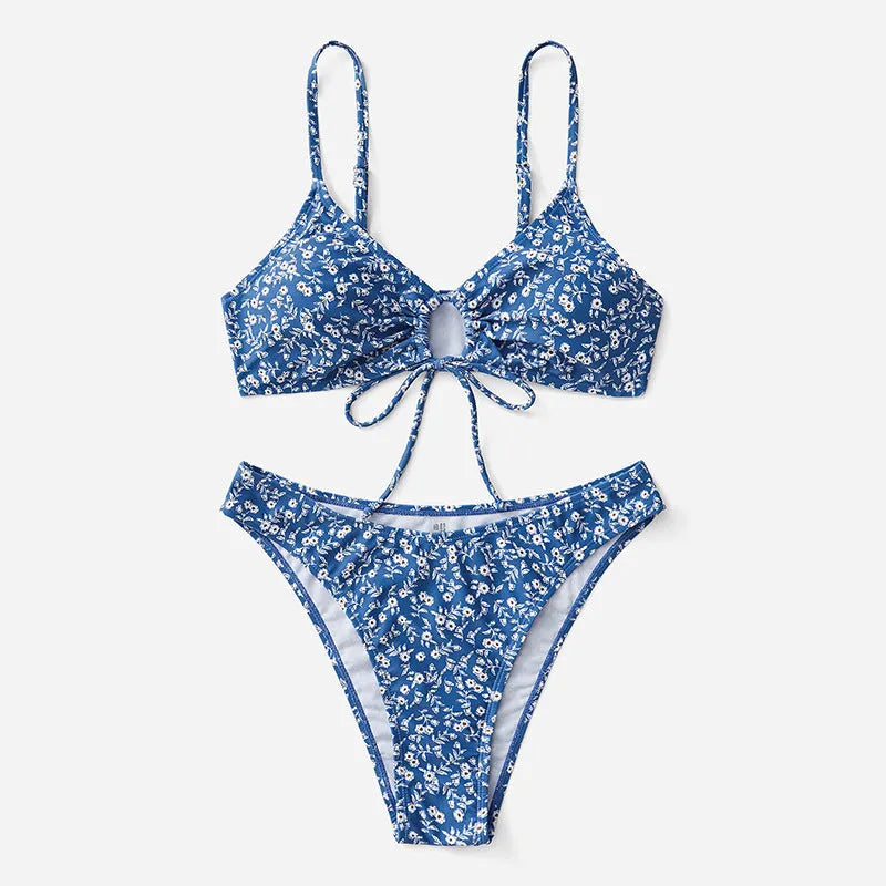 Blue polyester three-piece women's swimsuit set with top and shorts