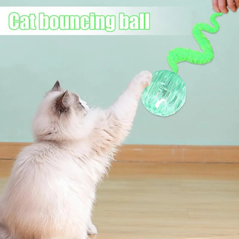 Interactive cat toy with three bouncy TPR balls connected to long plush tail in green colour