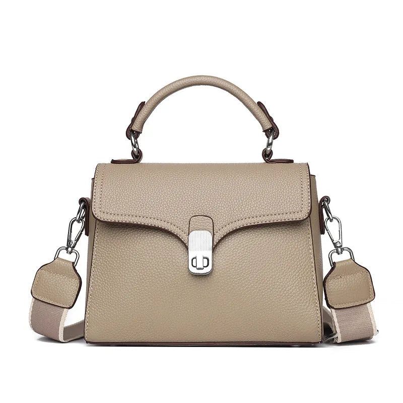Korean commuter women's portable cross-body bag genuine leather oval shape in black with sandwich pocket