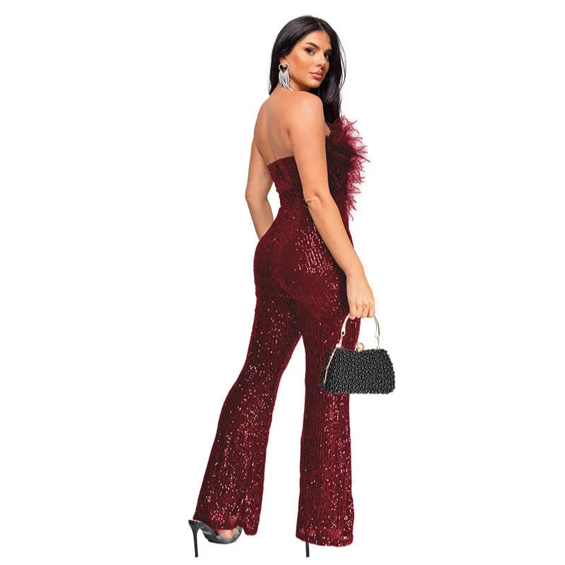 Women's sleeveless backless jumpsuit with flared legs in a champagne colour on a mannequin.
