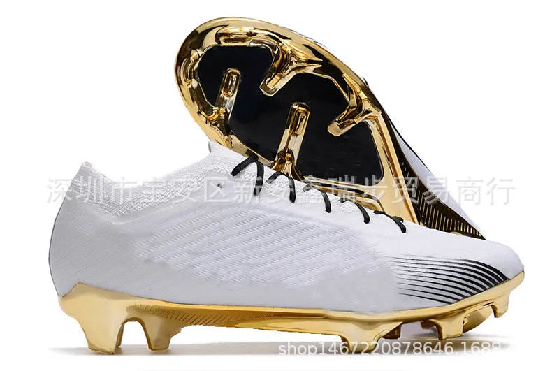 Men's knitted blue and white football shoes with FG studs and a lace-up front.