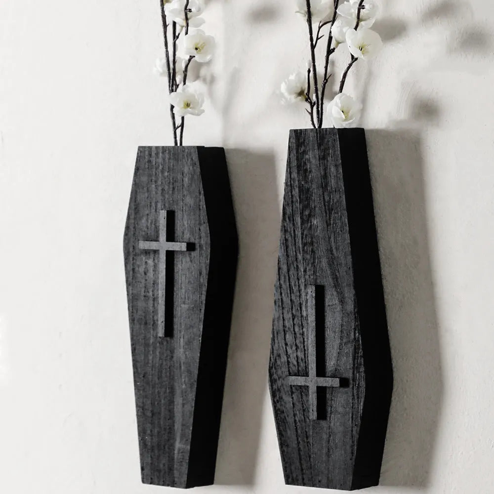 Wooden cross wall shelf decoration in black with integrated vase shelf measuring 27cm by 9cm