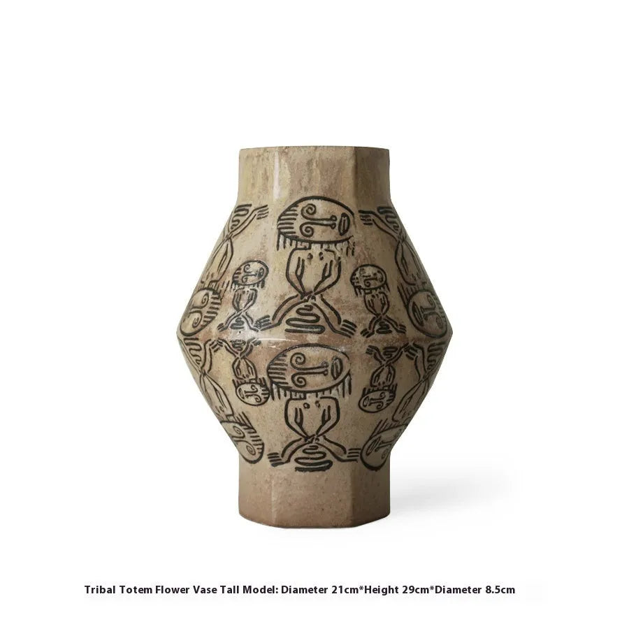 Hand-painted ceramic cylindrical vase with carved tribal totem vintage design.