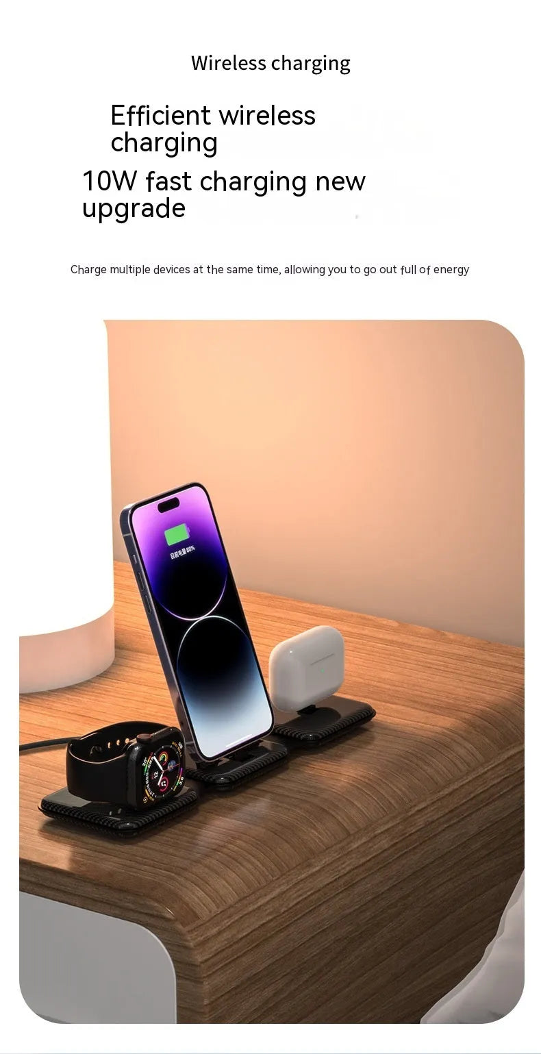 A75 Three-in-one Wireless Charger in white, charging a smartphone, earbuds, and smartwatch on a desk
