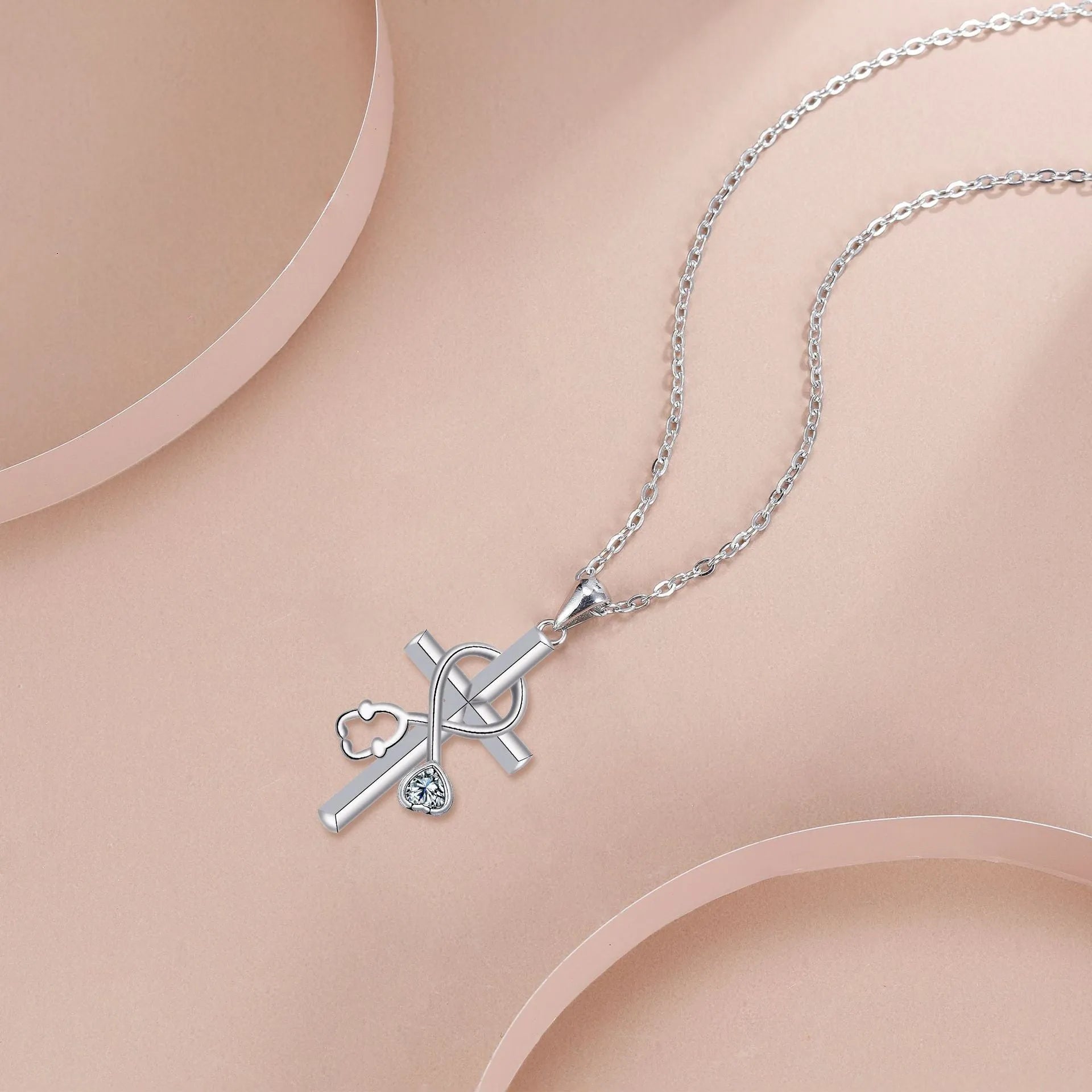 Cross stethoscope necklace with copper pendant on cross chain, medical-themed women's jewellery