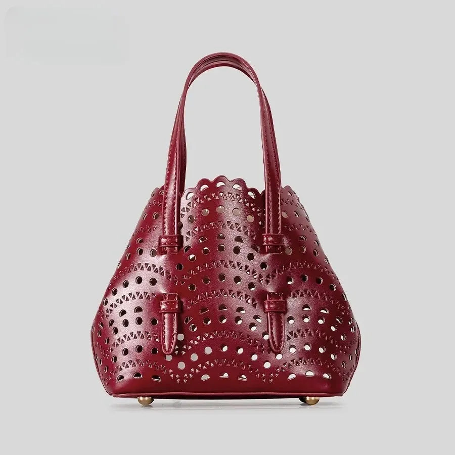 Hollow carved PU messenger bag with three shoulder straps in horizontal square shape