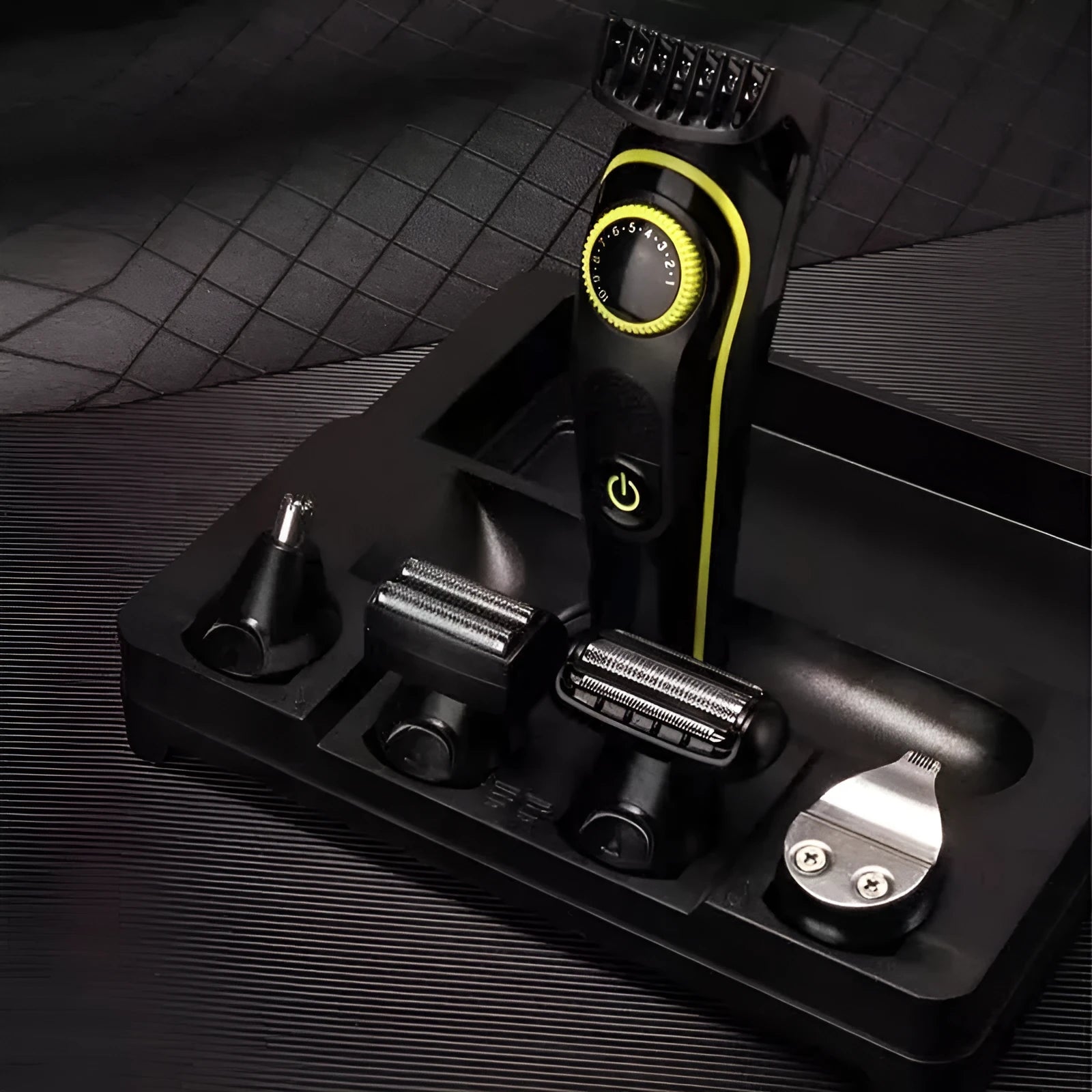 Black KM-696 electric hair clipper set with USB charging cable and cleaning brush
