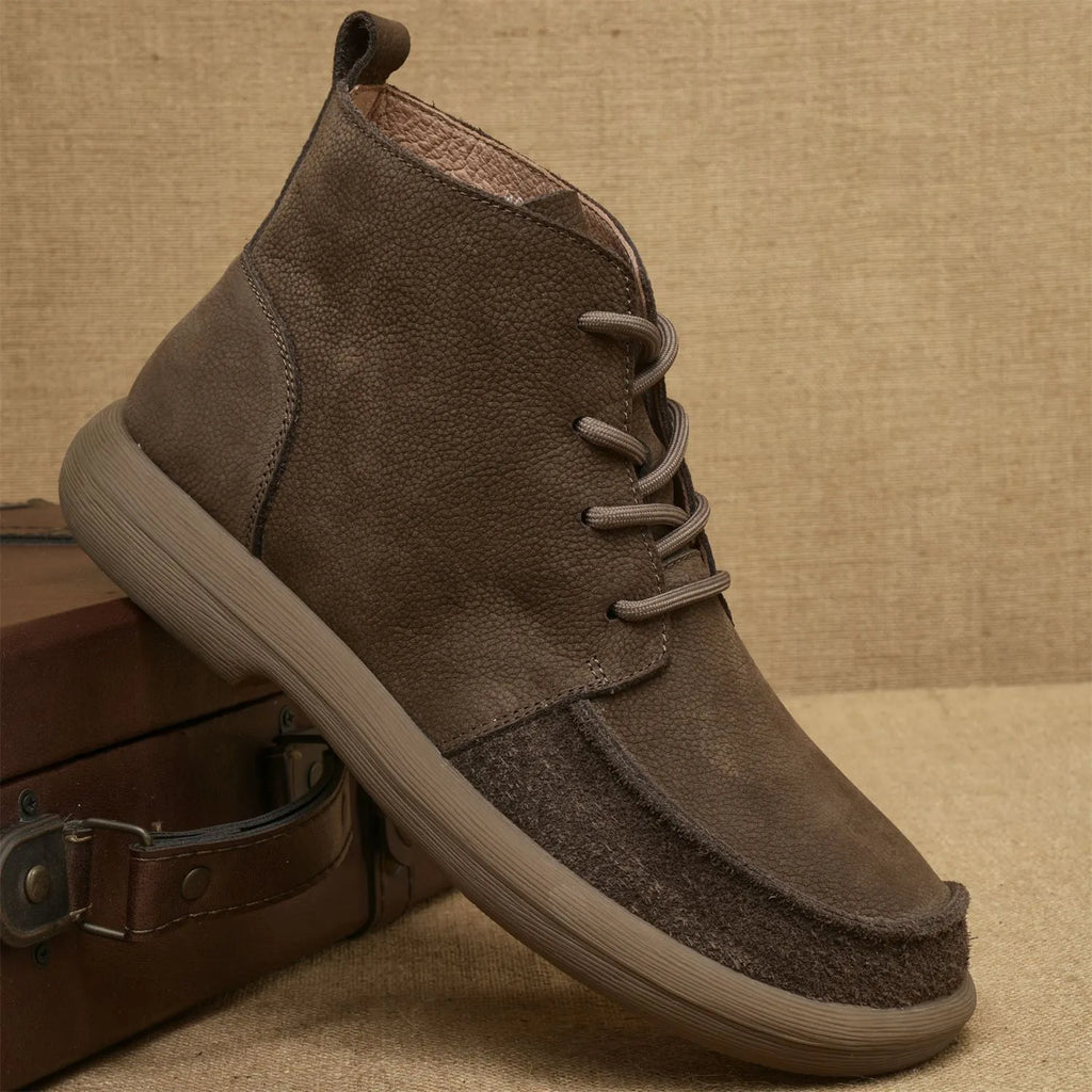Women's grey genuine leather Martin boots with wedge heel and lace-up front.