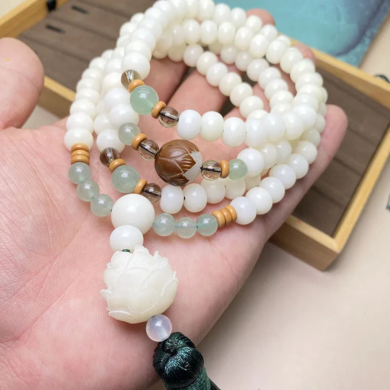 White Jade Bodhi 108-bead bracelet showing bead detail, available in three styles and sizes.
