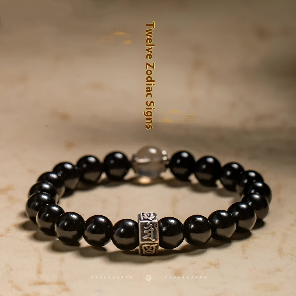 Obsidian zodiac bracelet with 8mm beads showing ethnic styling and traditional Chinese animal symbolism
