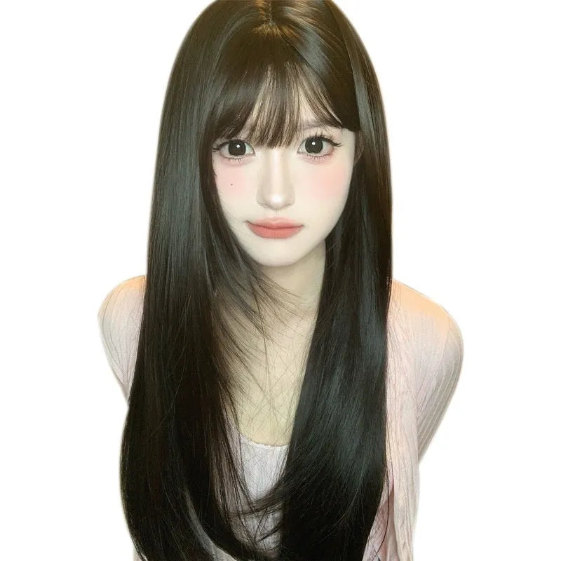 Dark brown long straight women's wig with bangs on wig head