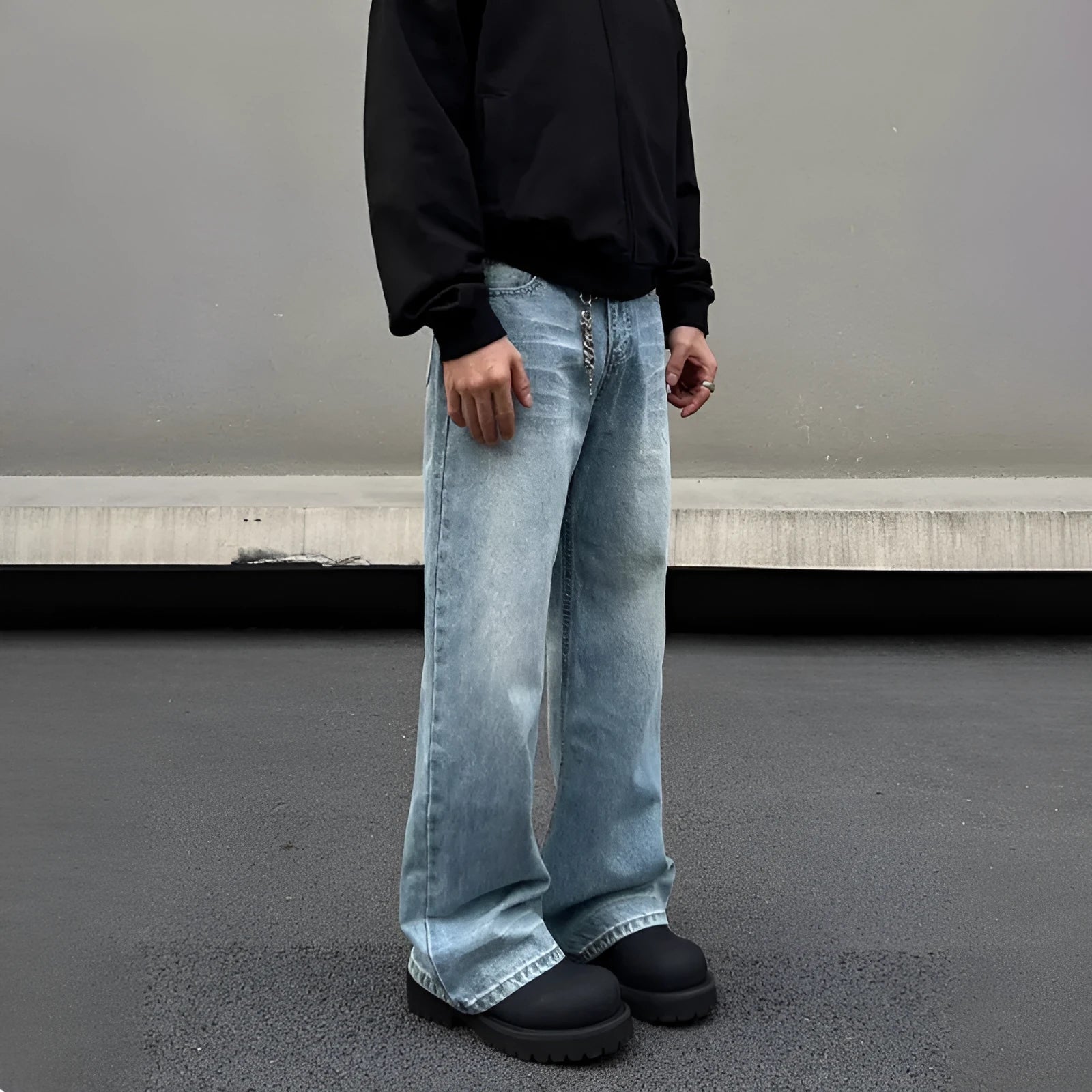 Men's blue straight leg jeans with whisker wash detail and wide leg flare
