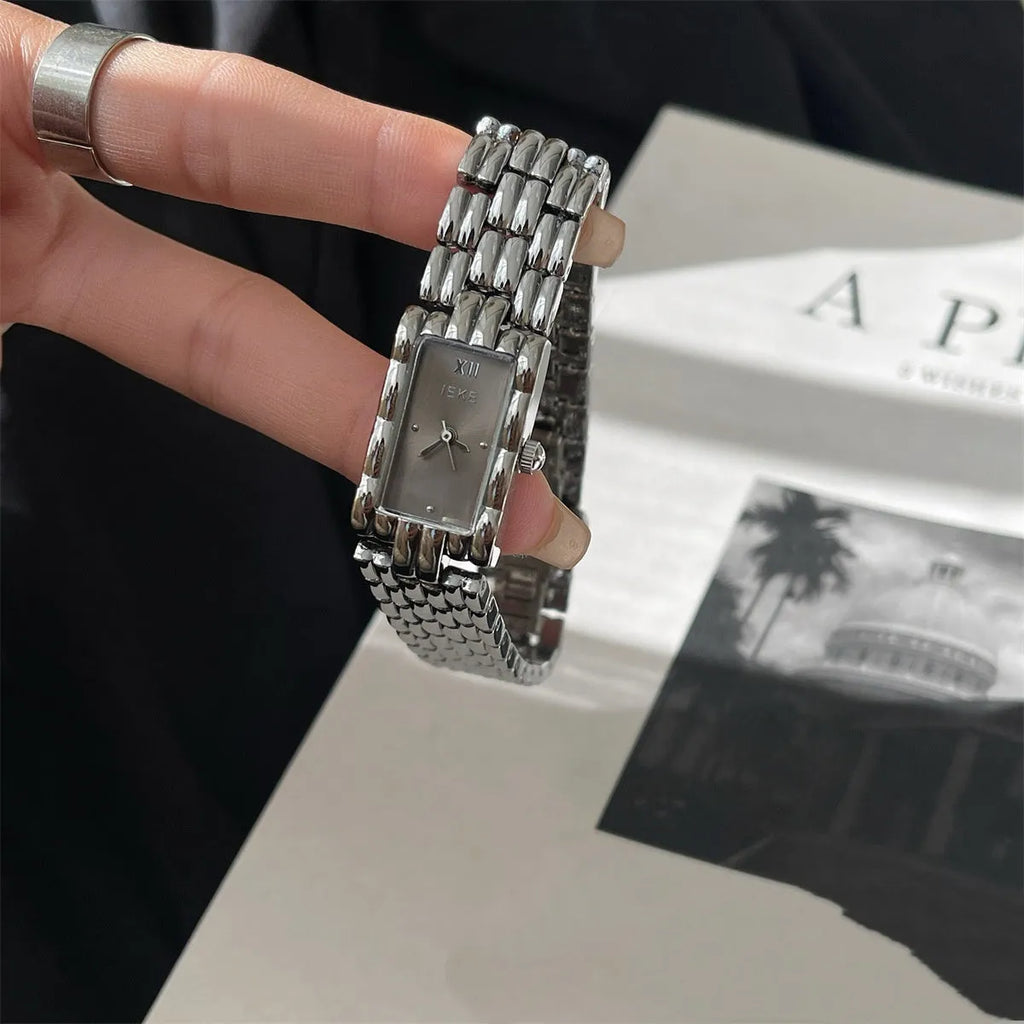 Women's antique-style bracelet watch with butterfly clasp in silver or gold with white or grey dial faces