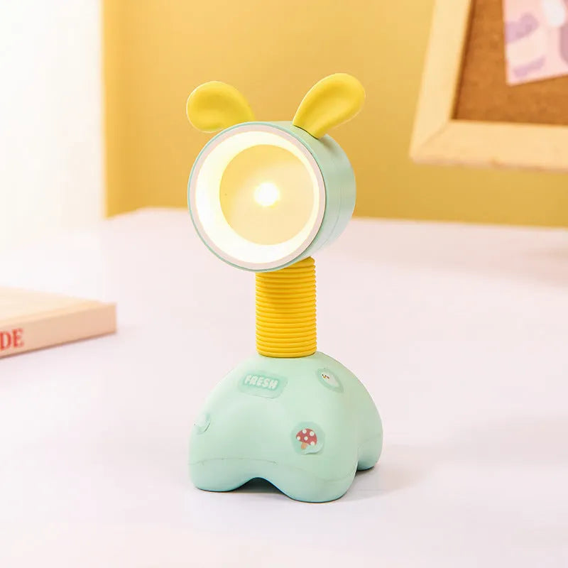 Cartoon animal magnetic night lamp with adjustable head on metallic surface