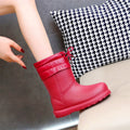 Women's mid-calf EVA waterproof snow boots with velvet lining, platform heel, round toe, in black