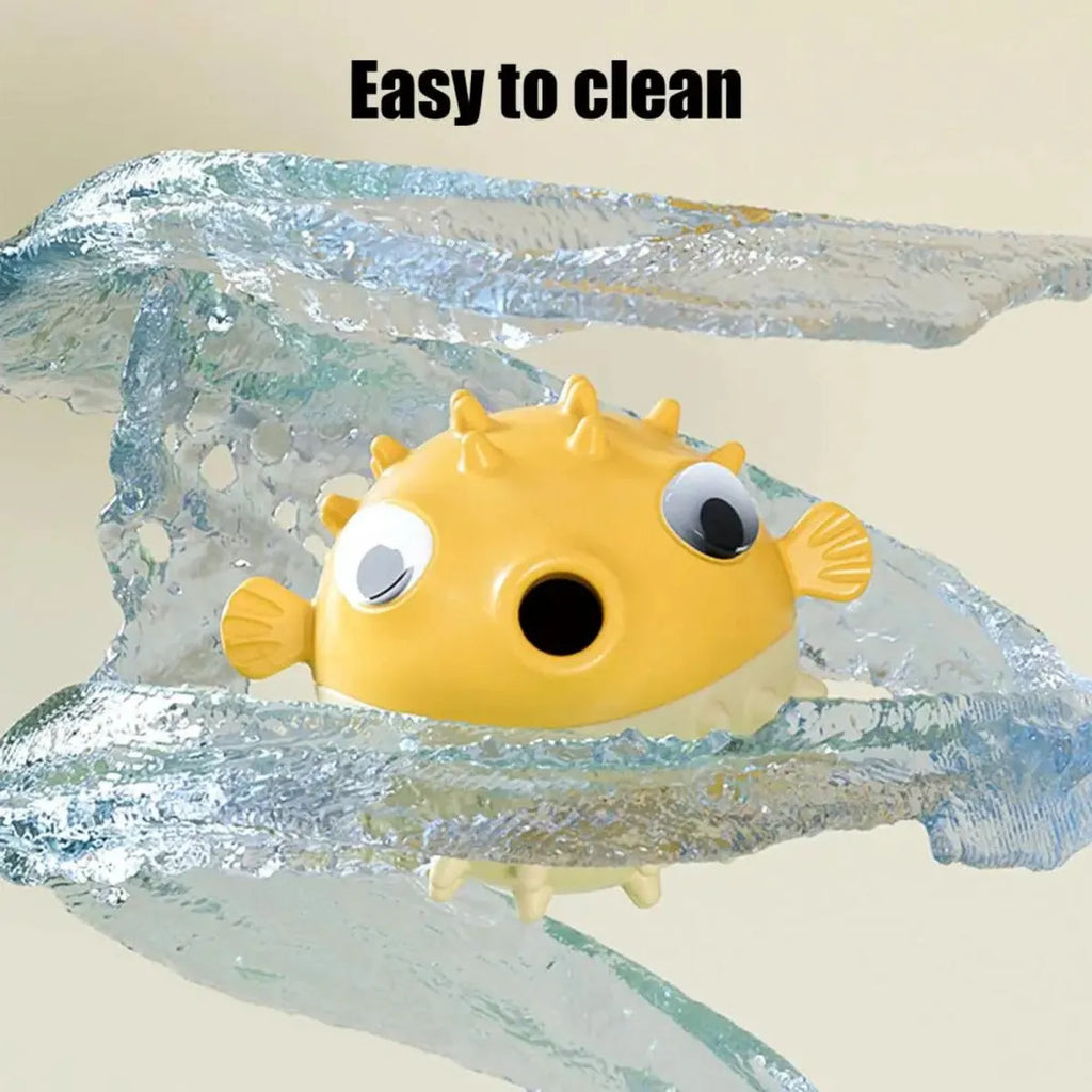 Yellow fish-shaped vinyl dog chew toy with textured surface for teeth cleaning.