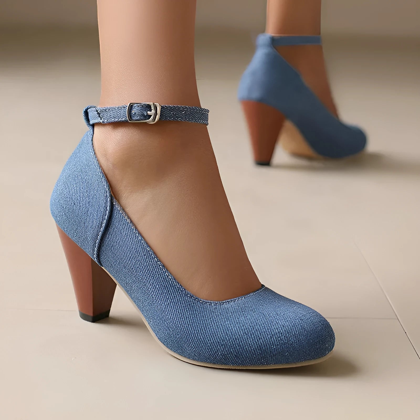 Women's blue denim platform high heels with an ankle buckle and waterproof sole.