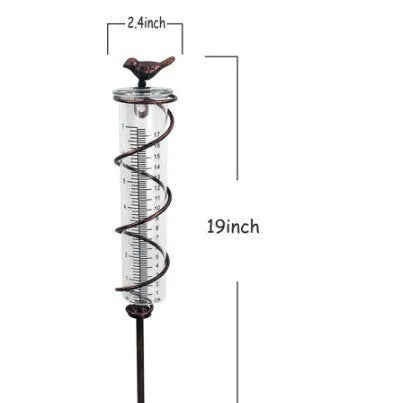 Cast iron hummingbird garden rain gauge with glass measurement tube showing 1-20cm scale
