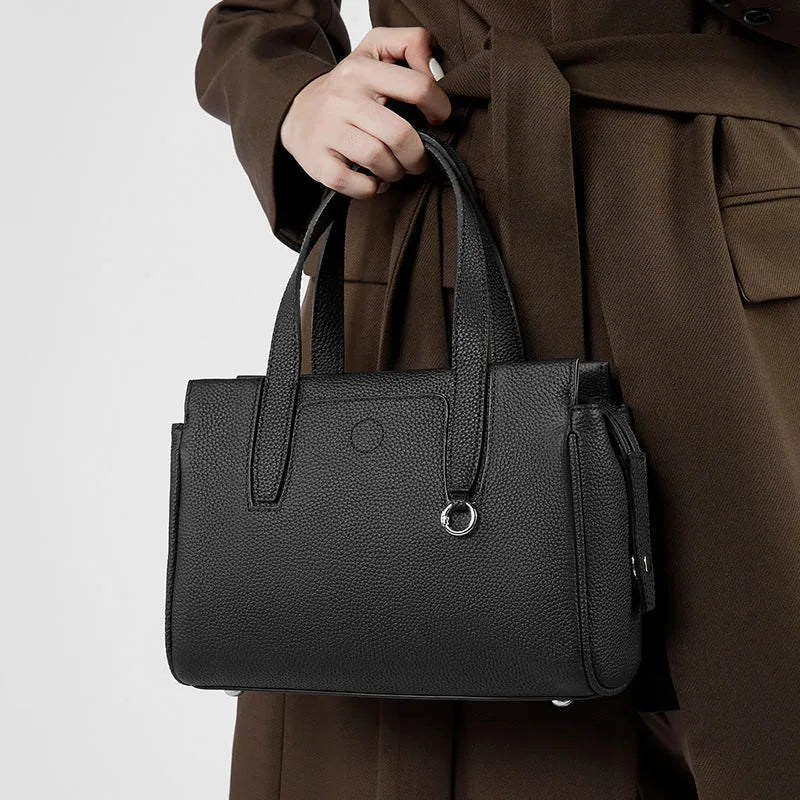 Genuine leather large-capacity crossbody bag in horizontal square shape in black colour with shoulder strap