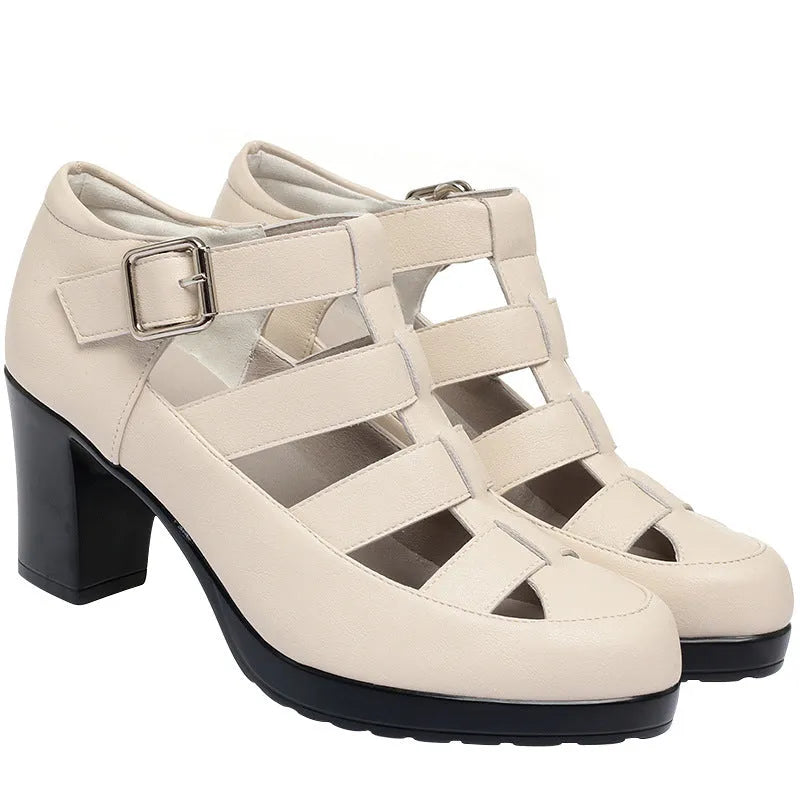 Women's beige closed toe sandals with chunky heel, ankle strap, buckle, and back zipper.