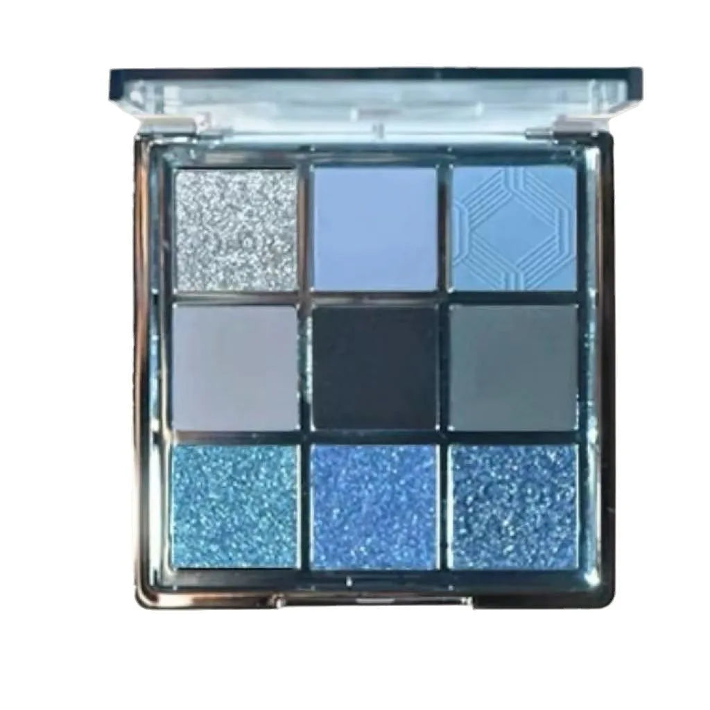 MUGELEEN nine-colour eye shadow palette showing low saturation blue smoked tones with matte and shimmer textures