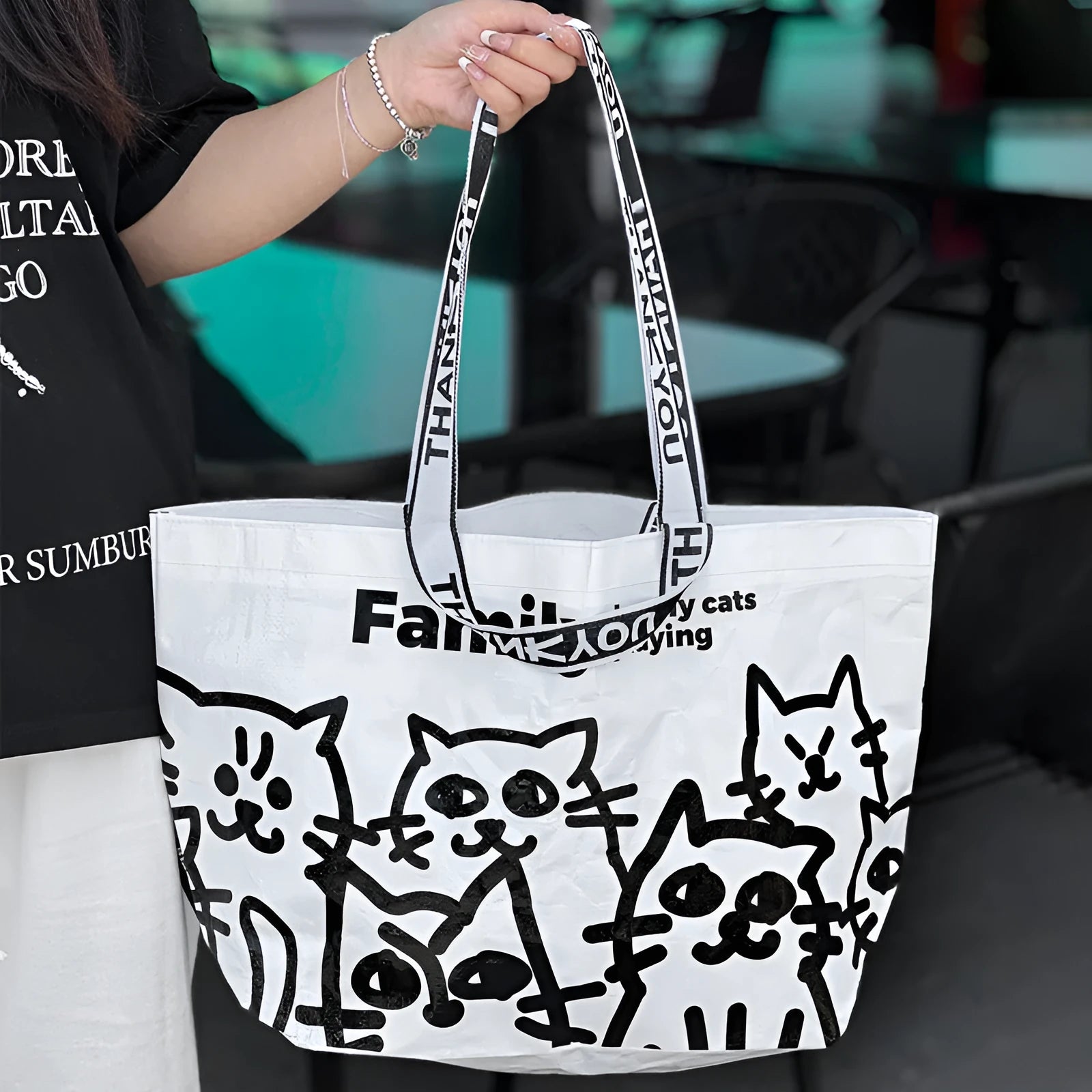 Green waterproof woven handbag with colour printing, portable size for shopping and daily carrying