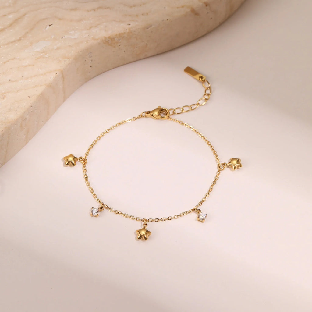 Women's stainless steel bracelet with 18K gold plating and geometric hexagonal star pendant jewellery