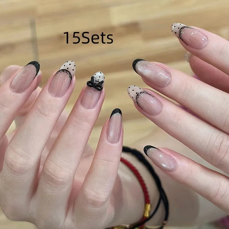 Set of sweet girl themed false nail tips with various designs for short to medium natural nails.
