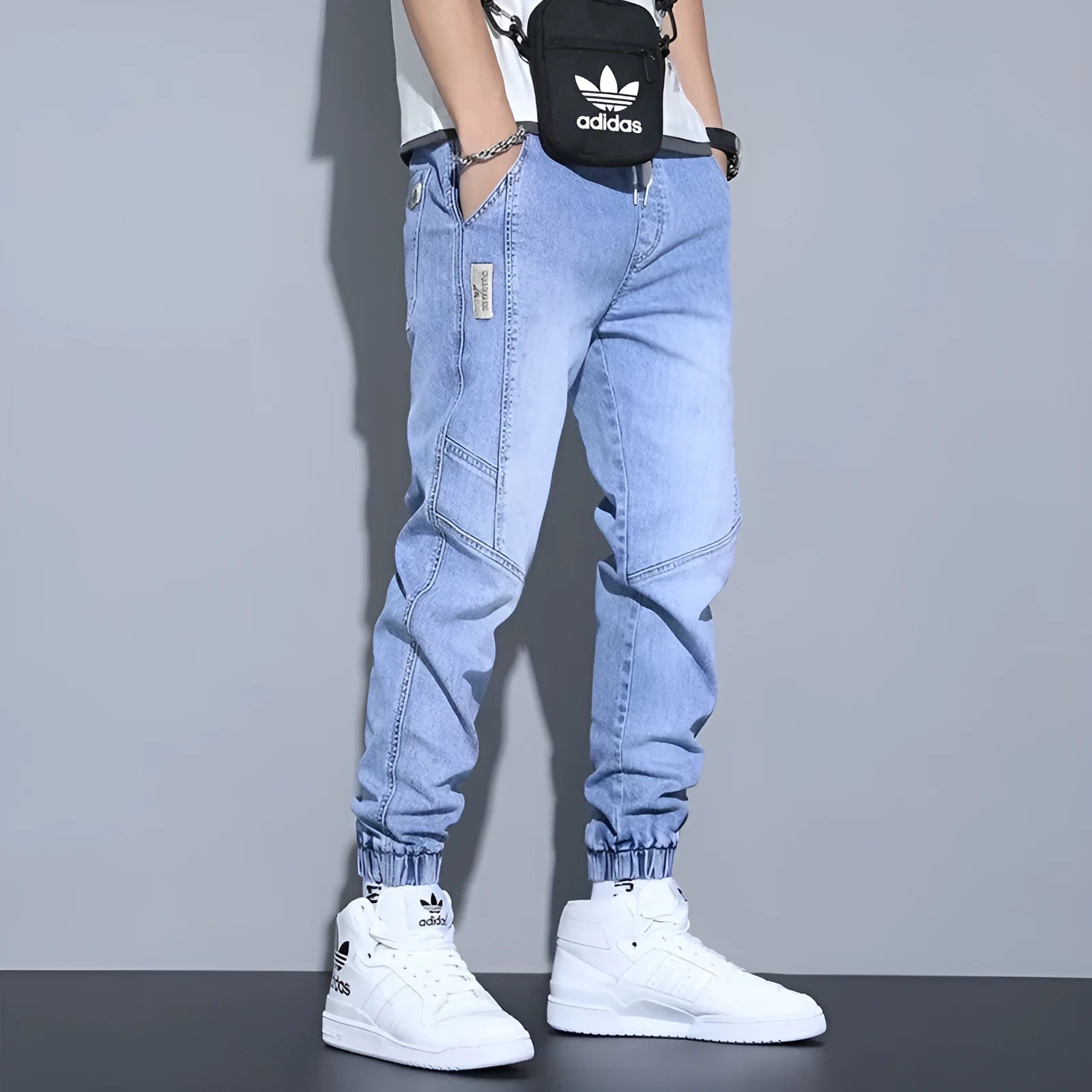 Men's slim fit high-waist ankle-tied harem jeans in denim cotton, available in black, blue, gray