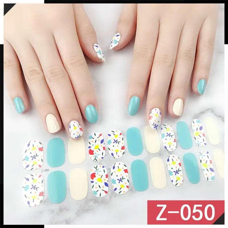 Korean Exquisite Nail Stickers pack showing colourful cartoon, floral, and embellished designs with included nail file.